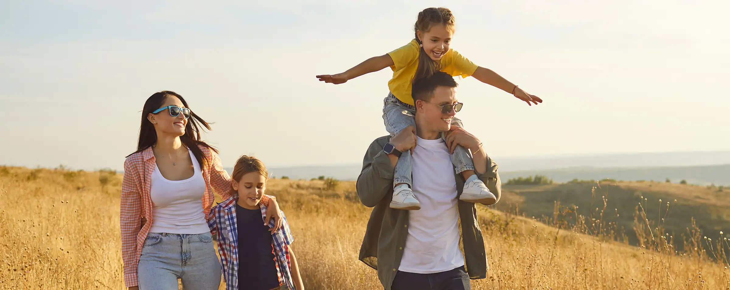 Family enjoying walk during sunset